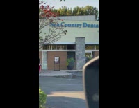 Woman black shirt sit sea country dental