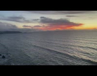 View of ocean sunset horizon from cliff