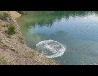 Guy does double backflip from mountainside to lake 