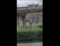 Woman with yellow sash dance at the park