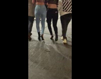 Woman crosses street in mismatched heels 