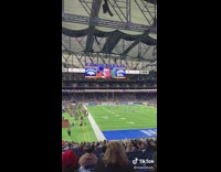 Guy doesnt break eye contact with football jumbotron 