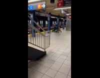 Guy rides around on a electrical scooter vehicle he made