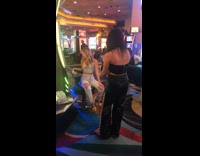 Collab IITW - Woman in white crop top poses in the casino