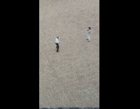 Collab IITW - Older guy tie dress pants dances courtyard 