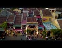 Drone paper lanterns city boats river cafe 