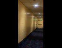 Guy hit chest echo in theater hallway