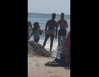 Man white swim shorts picture on beach