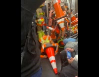Collab Subway Creatures - People traffic cone costume dances in train