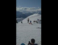 Woman beige bra sits on mans shoulder snow mountains