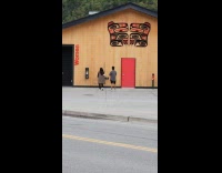 Collab IITW - Man and Woman dances front of public bathroom