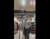 Woman chases after shopping cart as it rolls away filming tiktok