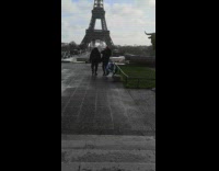 Three men rap music video Eiffel Tower
