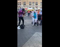 Old woman gets off walker to dance in public
