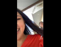 Two girls running through parking lot church