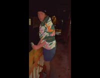 Filter on guy changes his shirt with flowers and gives him hat 