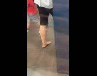 Man in white seen with no shoes at station 