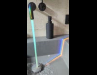 Water from faucet produces rainbow from sunlight