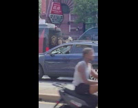 Man makes baby yoda puppet dance to the music