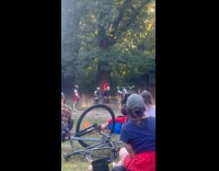 People watch medieval knight group fight each other