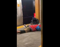 Random guys sleeps at the subway platform