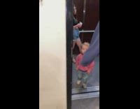Guys run into baby in elevator shocked 