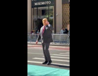 Trump impersonator do hand gestures on street