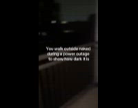 Woman walks to balcony naked during power outage