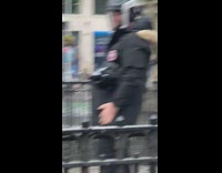 Guy wears black and grey ventilated helmet 