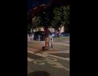 Couple ride single scooter carry pizza boxes part 1