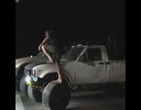 Guy backflip white truck hood parking lot