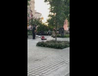 Couple dance while man plays saxophone 