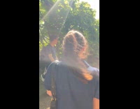 Woman greeting strangers alphabetically