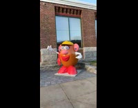 Mr. Potato Head across Mrs. Potato Head at the street