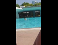 Girl sunglasses spin around  pool selfie video