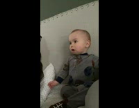 Woman asks baby to say mommy and he breaks glass