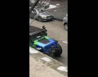 Guy has photoshoot with colorful Jeep snowstorm 