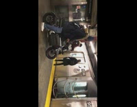 Man drives motorcycle scooter into subway train