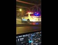 Police follow guy ride bike on bridge