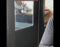 Two ladies brunch restaurant white brick wall