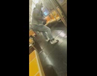 Purple shirt guy stomps dances subway train 
