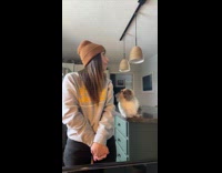 Woman pranks cat pretending not to see her 