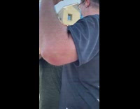 Small man picking fight with protester sidewalk