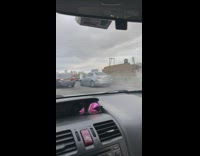 Cars Hood Smokes on Freeway 