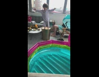 Collab SendItOfficiall - Little kid jumps empty inflatable pool indoors