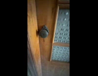 Man heats up doorknob with blow torch