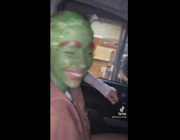 Two girls dressed up as full shrek ogre outfit 