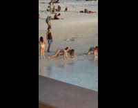 Three women bikini twerk dance on beach