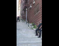 Girl poses on stairs from joker movie