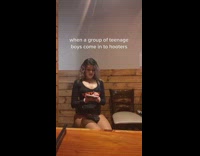 Woman in black outfit writing in notebook 